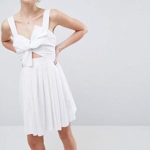 White linen bow mini dress